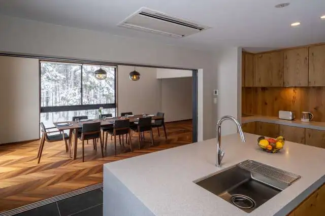 Another view of the dining area from the kitchen in the Jade Rabbit chalet