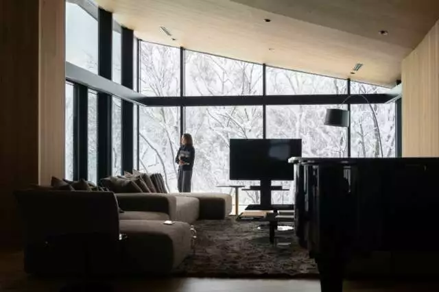 A lady in the living room of Tsubasa chalet