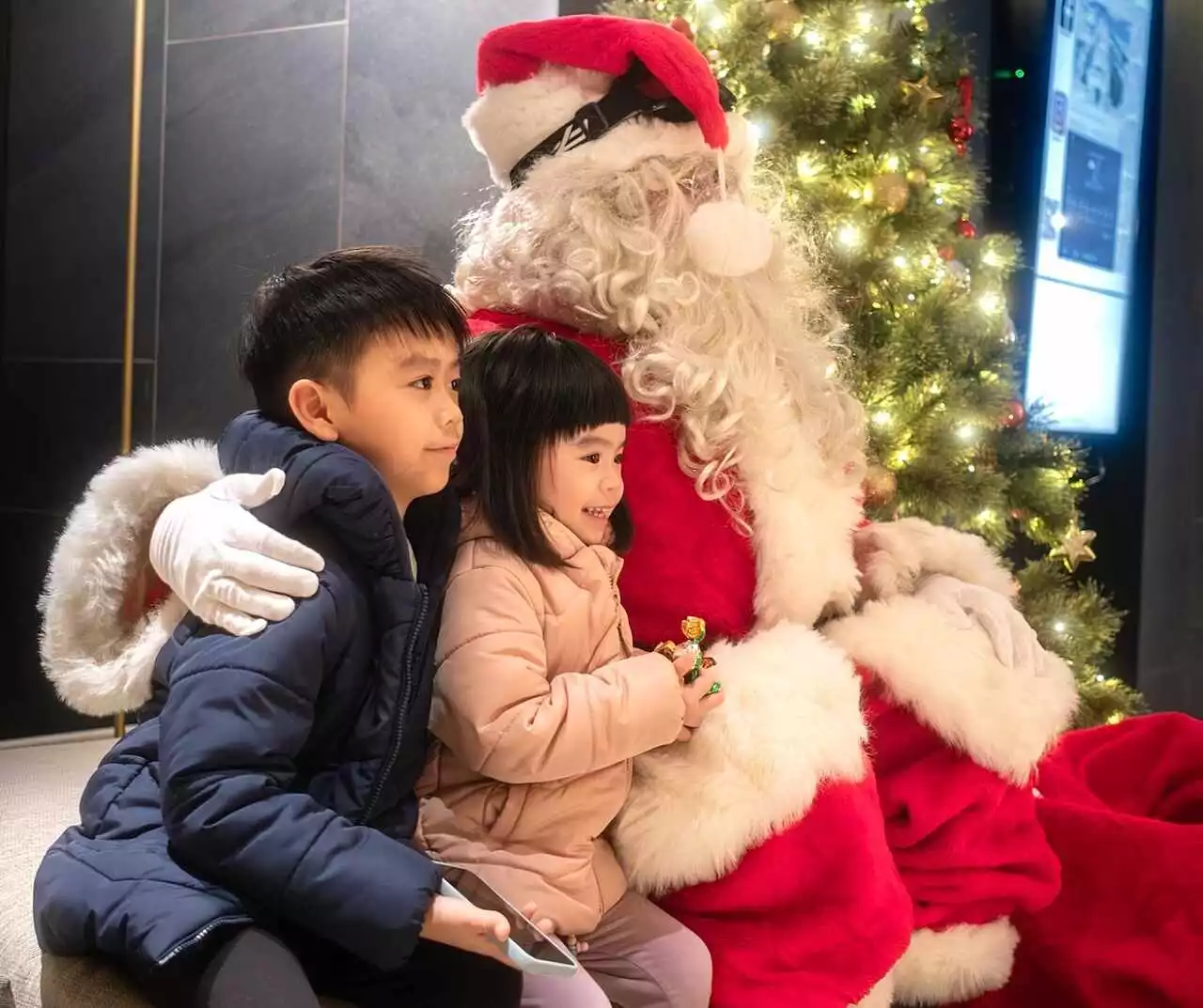 The Maples Santa with children With permission