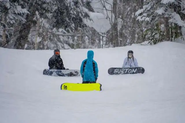 Furano ski resort snowboarders resting