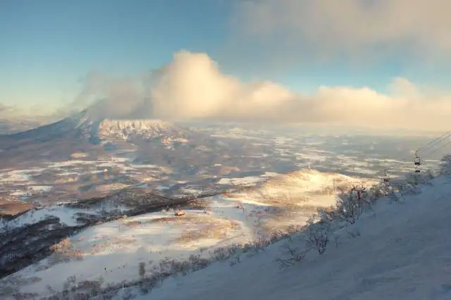Pizza box lift sunset hirafu ski resort mount yotei clouds